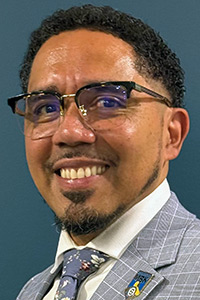 Headshot of Dr. Carlos Cotto.