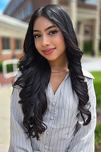 Headshot of Hema Singh.