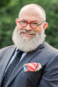 Headshot of Peter Lewis Gabak.