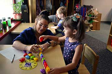 Early Childhood students working in the on-campus Laboratory Preschool.