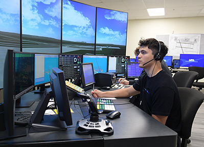 A student working at the ATC simulator.