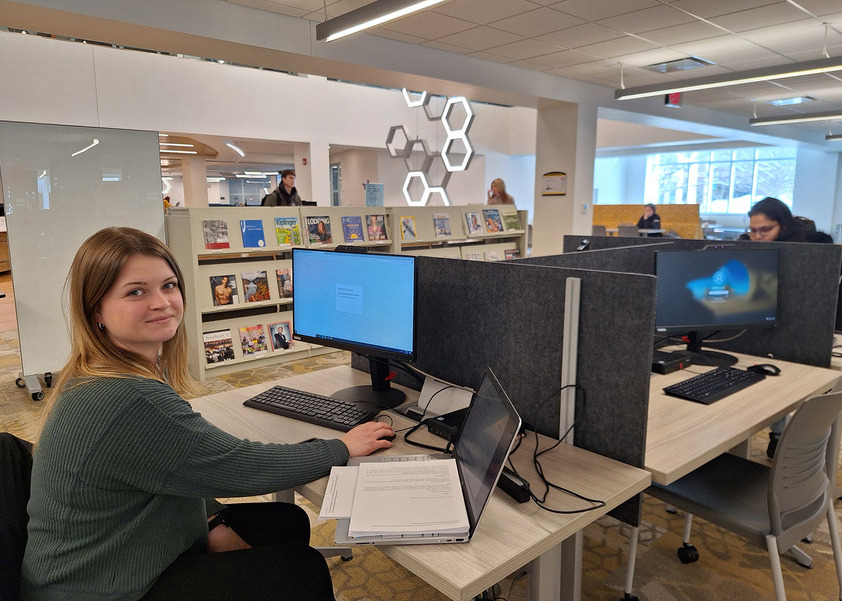 Students working on computers in the Begley Learning Commons.