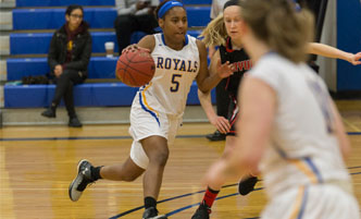 Women's basketball player on the court.