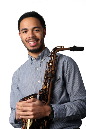 Male student in a blue shirt, holding a saxophone.