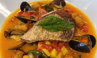 Examples of an entree offered at Casola Dining Room, a fisherman's stew.