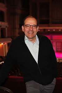 Jon Elbaum standing inside Troy Music Hall.