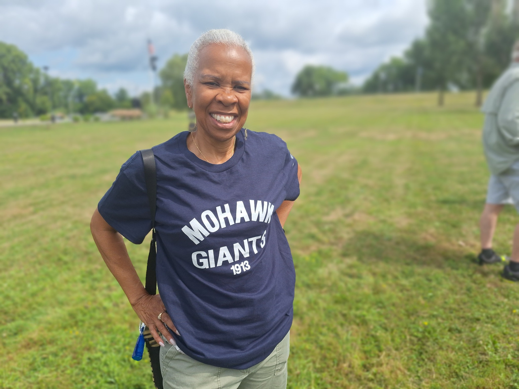 Cynthia Farmer wearing Mohawk Giants tshirt, smiling