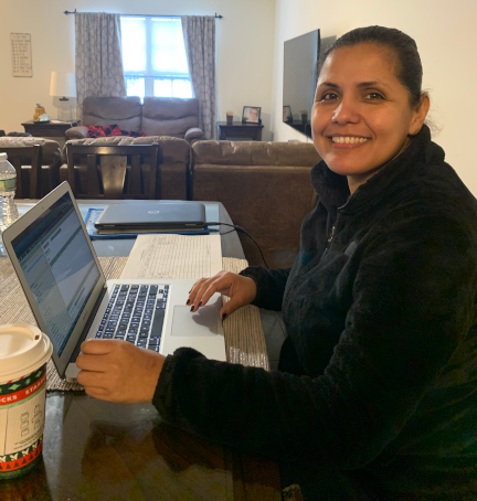 Brenda Beauregard on her laptop at home.