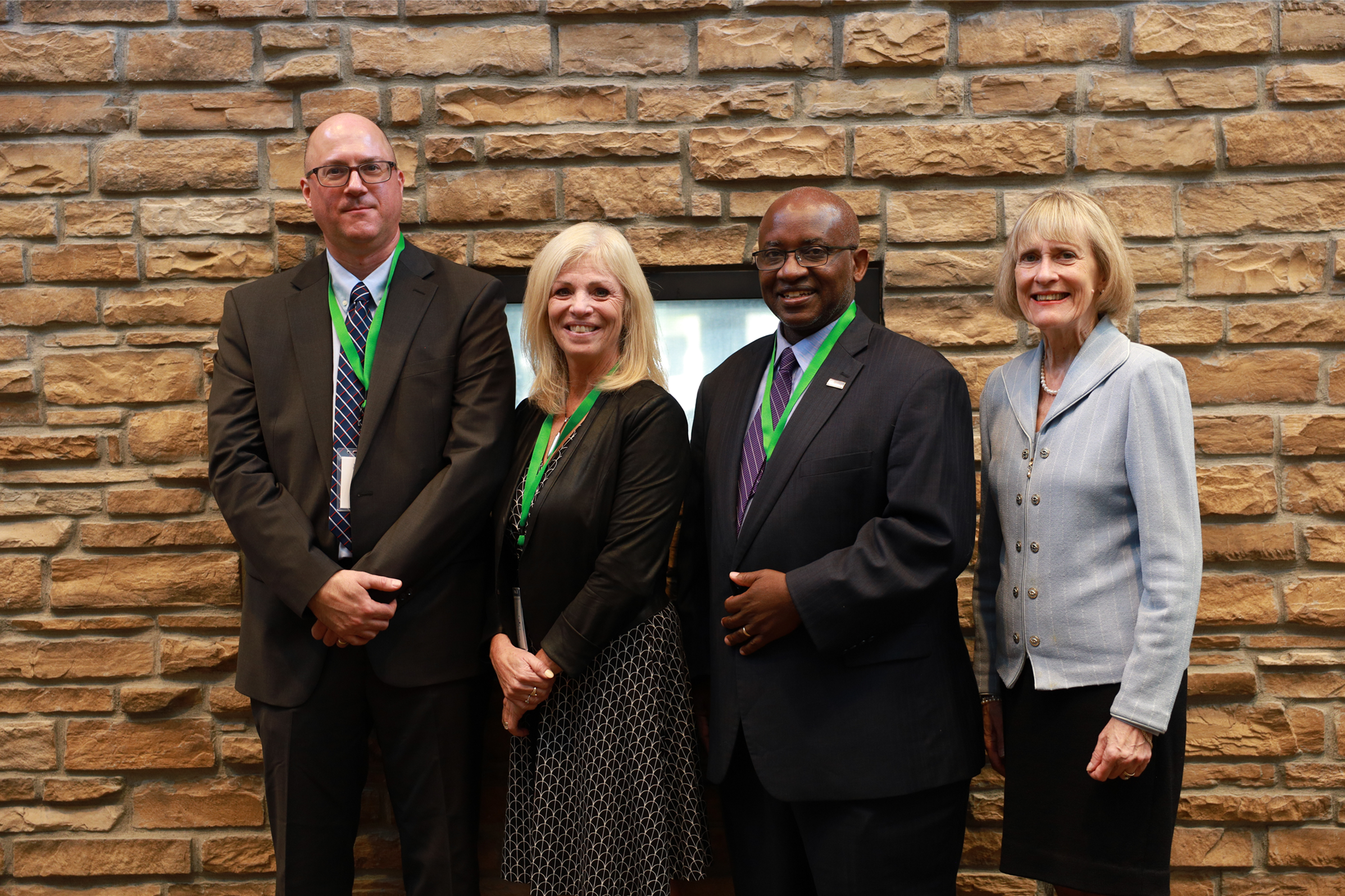 College Presidents standing together, smiling