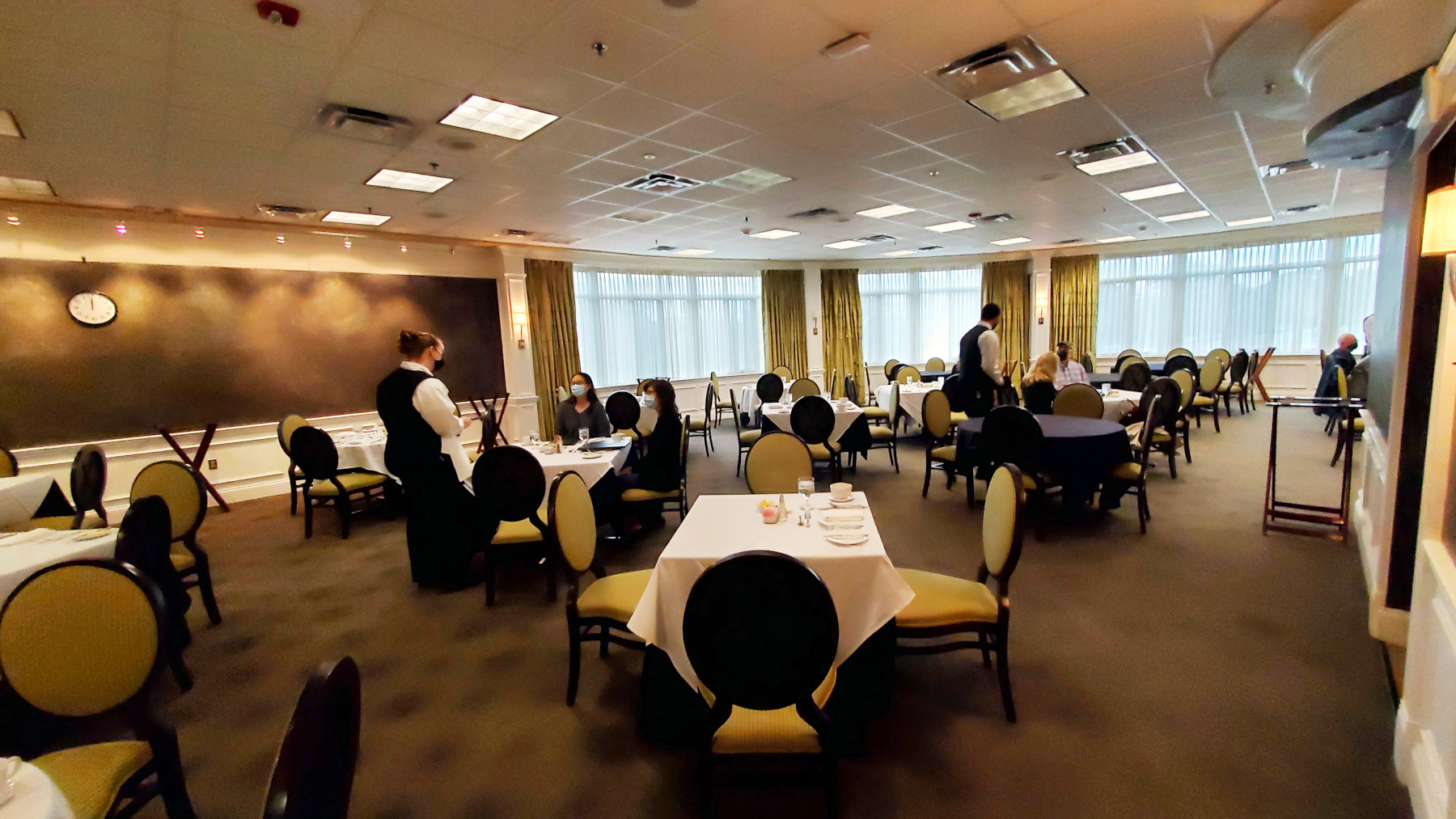 Guests eating in the Casola Dining Room 