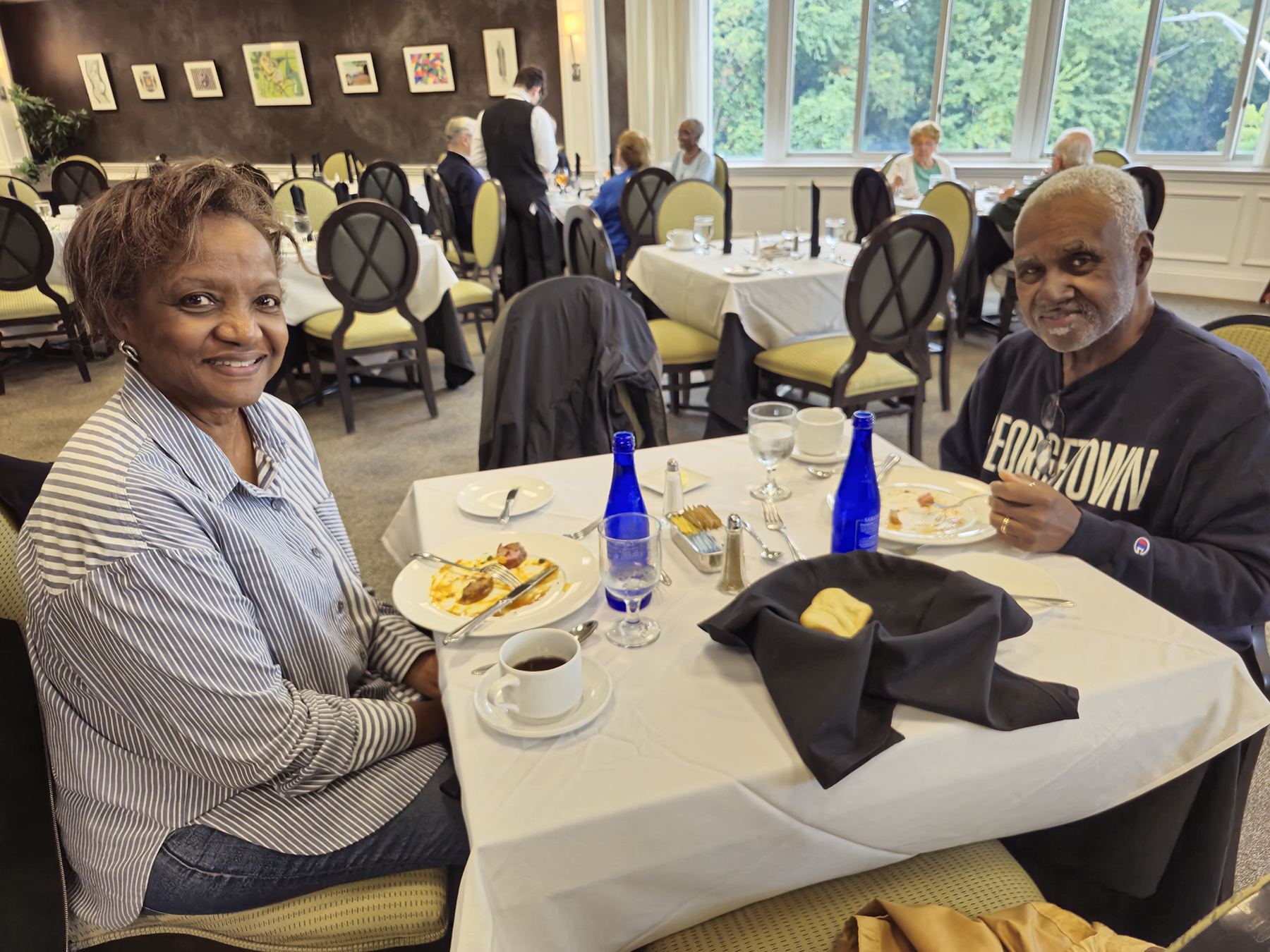 Two guests enjoying lunch in the Casola Dining Room