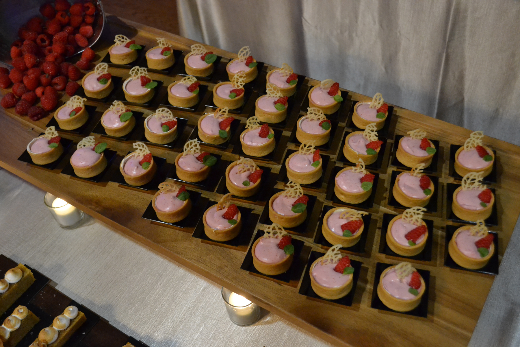 Miniature Raspberry Bavarian Tarts on tray on table