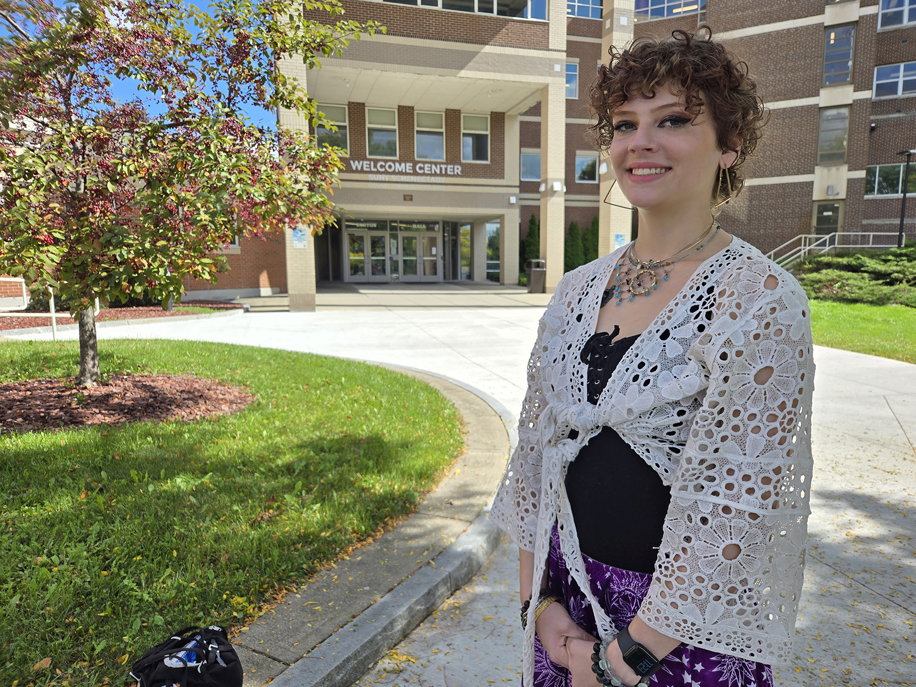 Chloe Connors standing outside in Quad, smiling