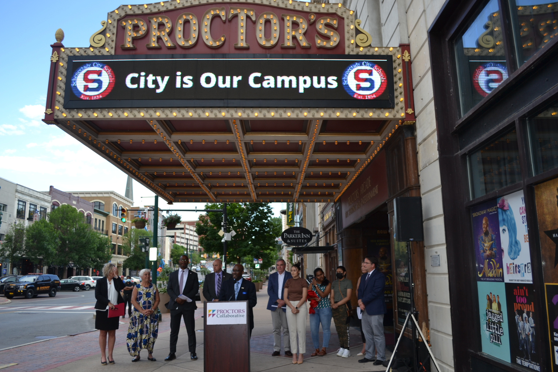 Dr. Moono speaking at podium