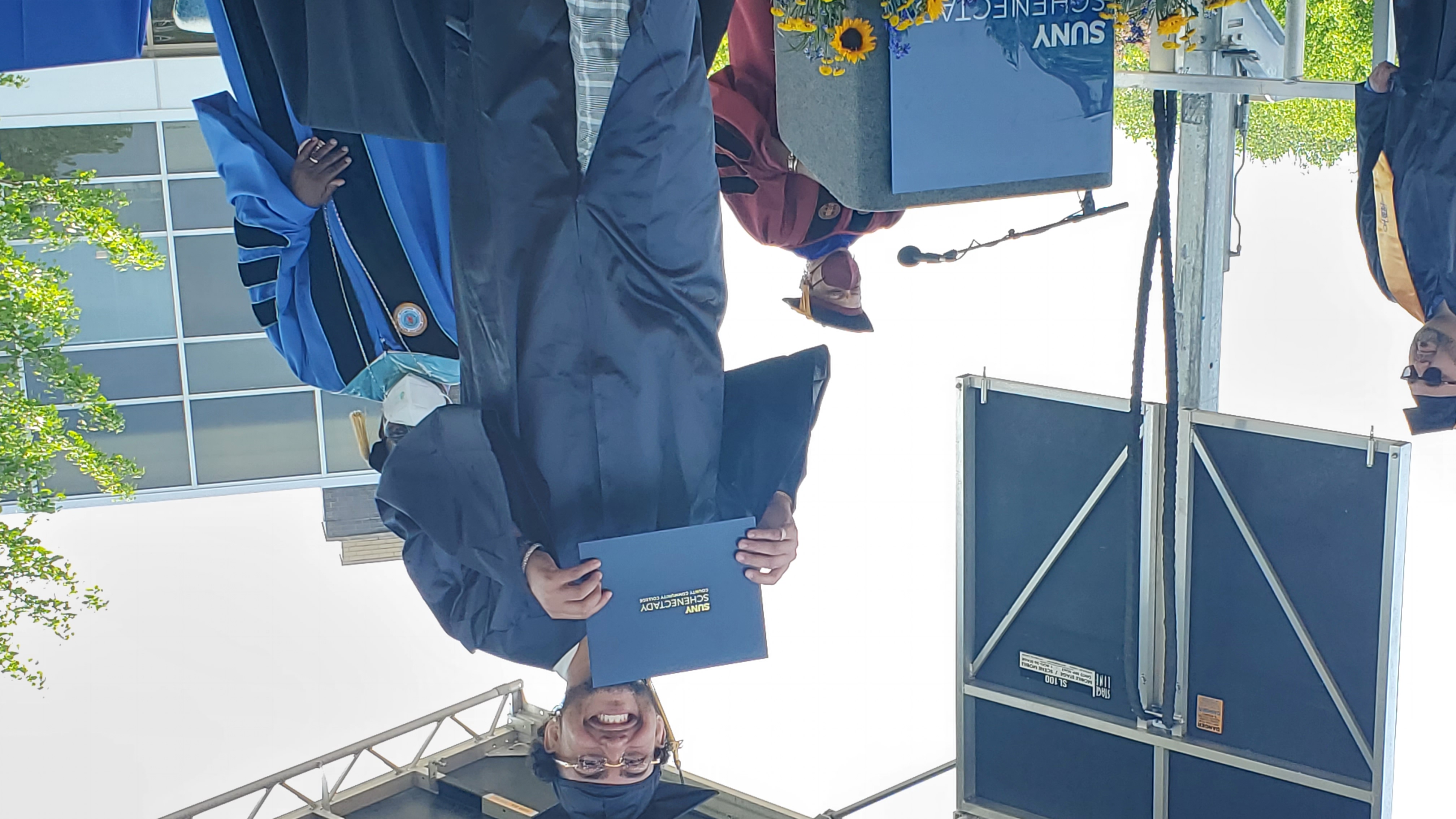 Male graduate on stage