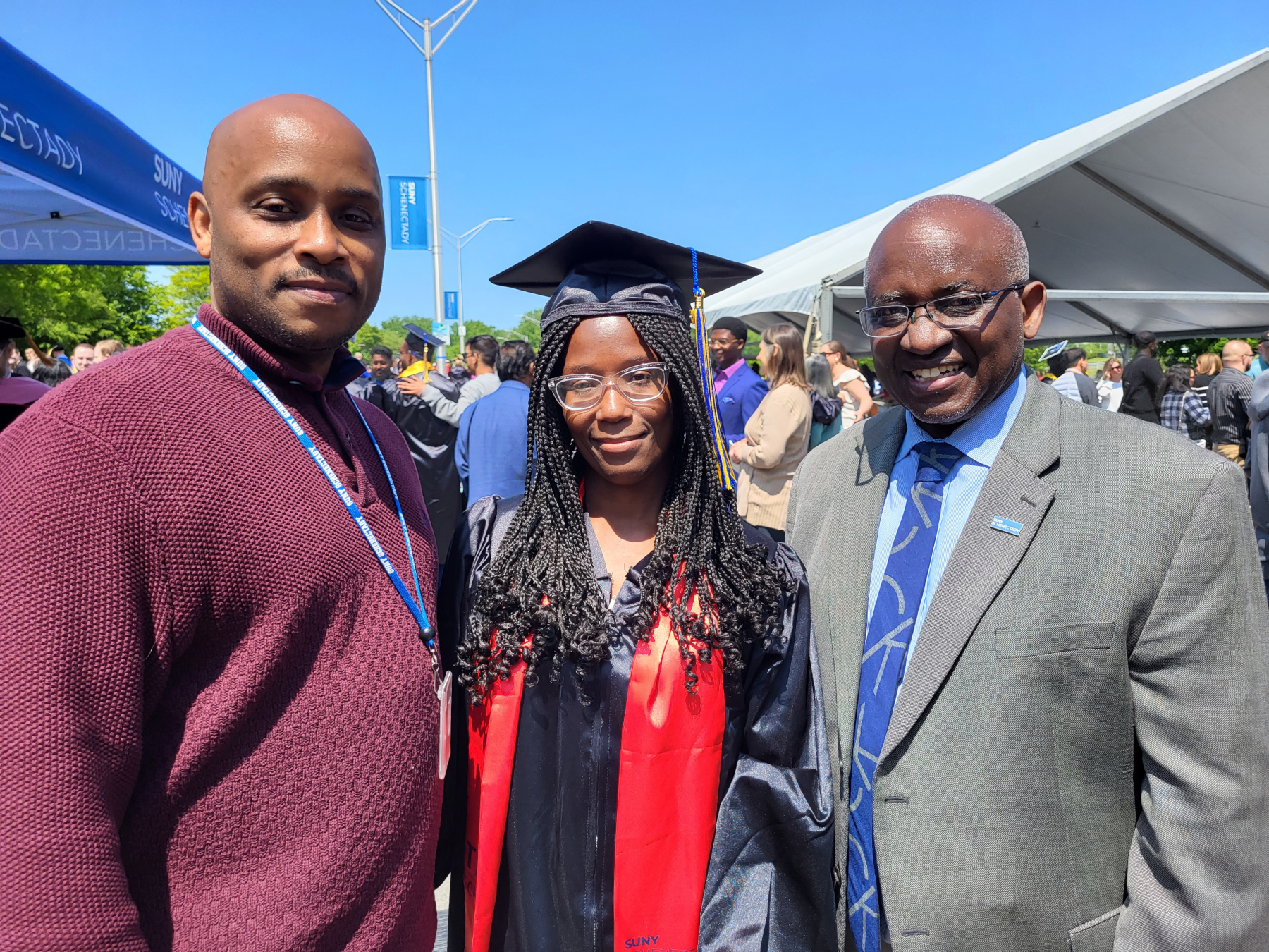 Dr. Moono, Harry Rolle with graduate
