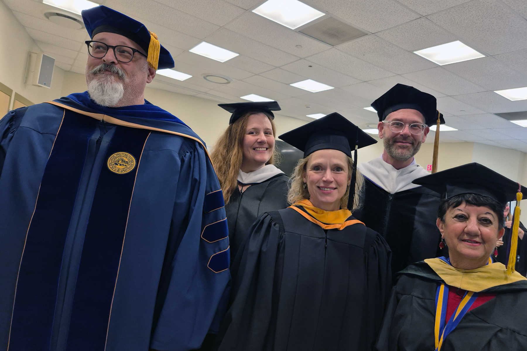 Faculty in cap and gown