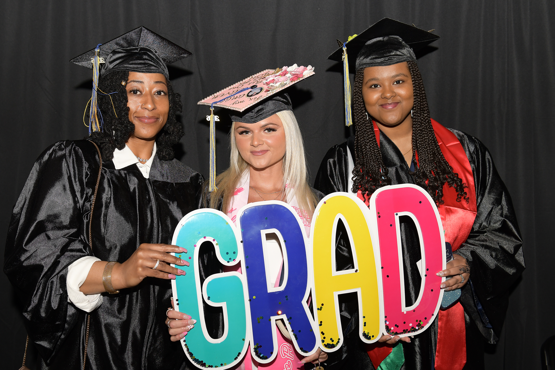 Graduates celebrating during Commencement 2026 inside the M&T Bank Center