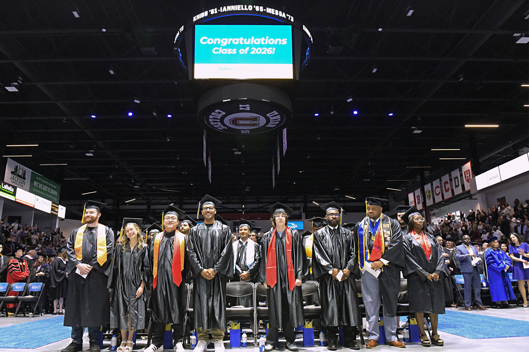 Graduates celebrating during Commencement 2026 inside the M&T Bank Center