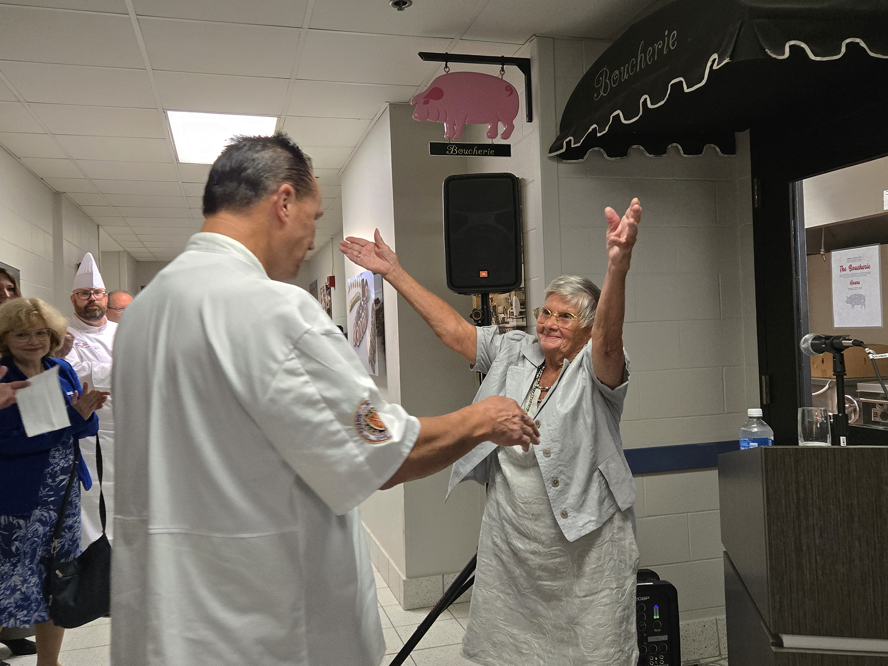 Joan Dembinski cheering for Dr. David Brough