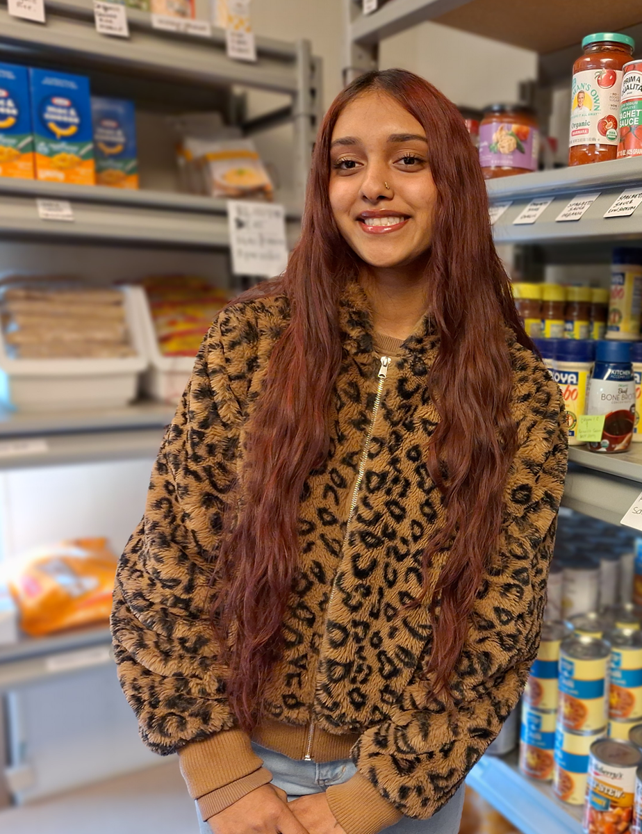 Deevashly Sawh standing in Food Pantry