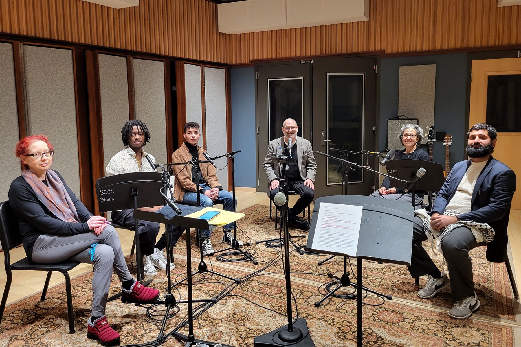 Dr. Babette Faehmel in recording studio with podcast guests