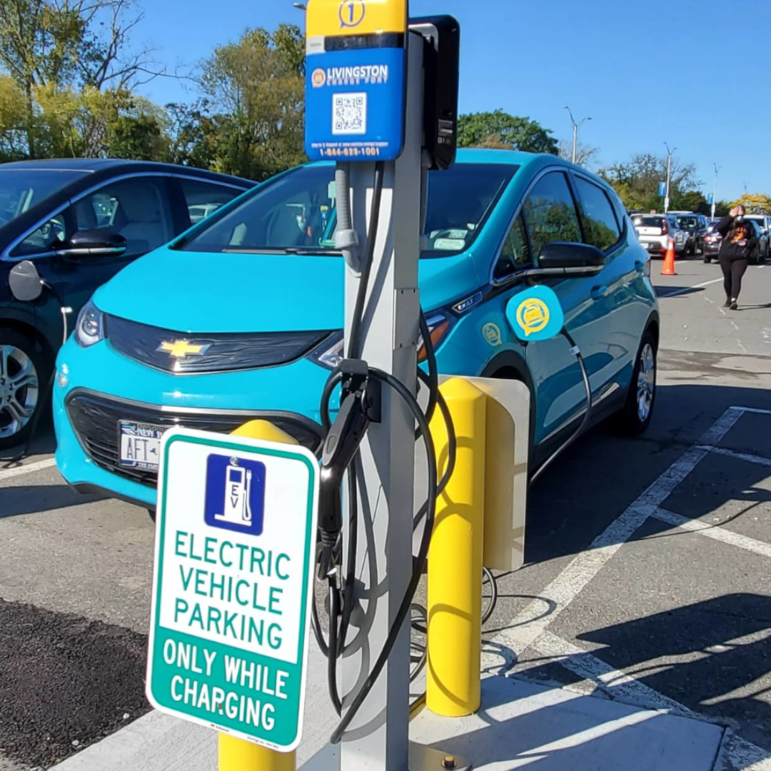 electric vehicle plugged into EV charging station