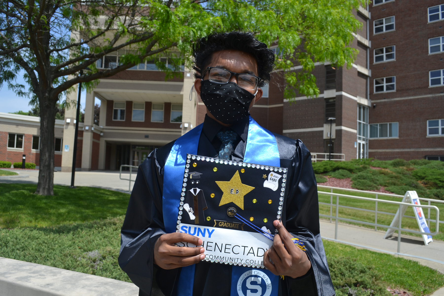 Ethan Depoo in cap and gown.