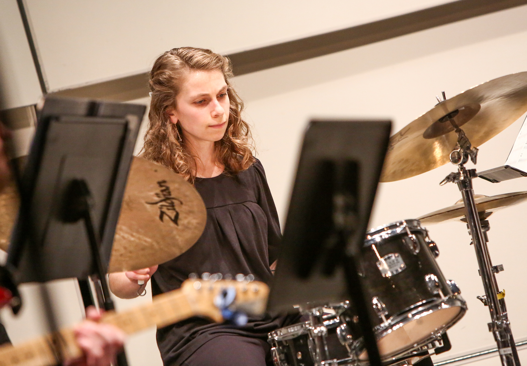 Student percussionist performing on stage