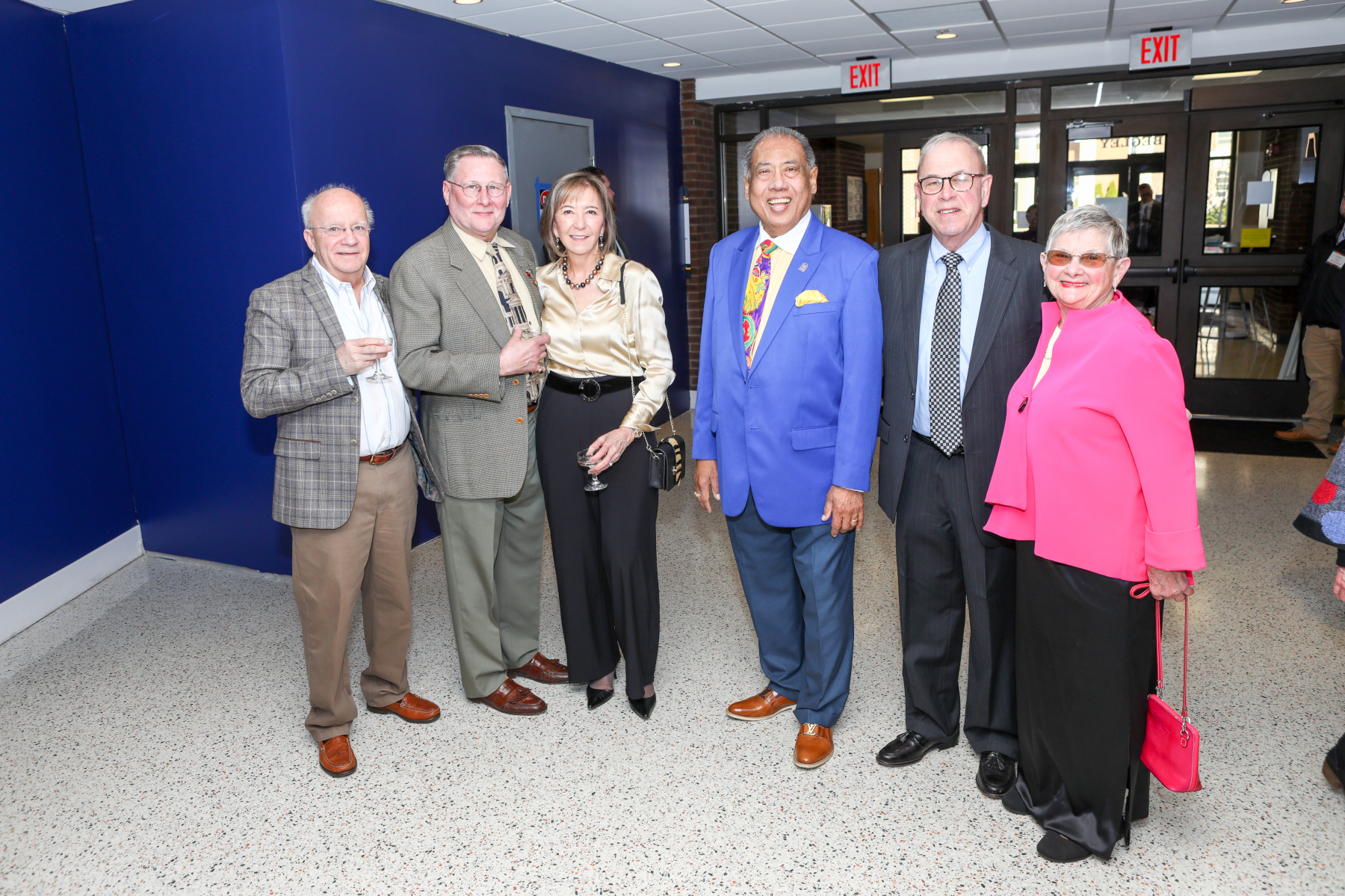 Attendees outside auditorium