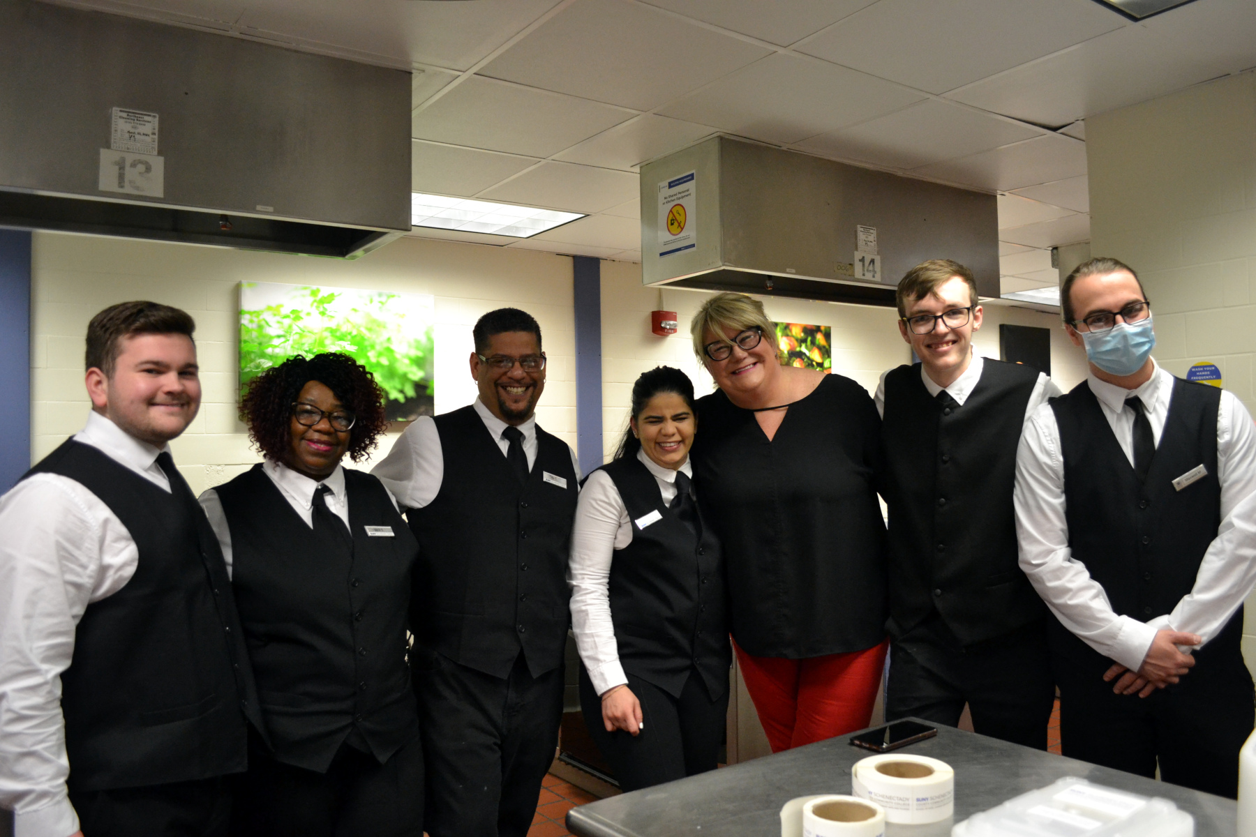 Assistant Professor Kim Otis and students in Culinary Arts Lab