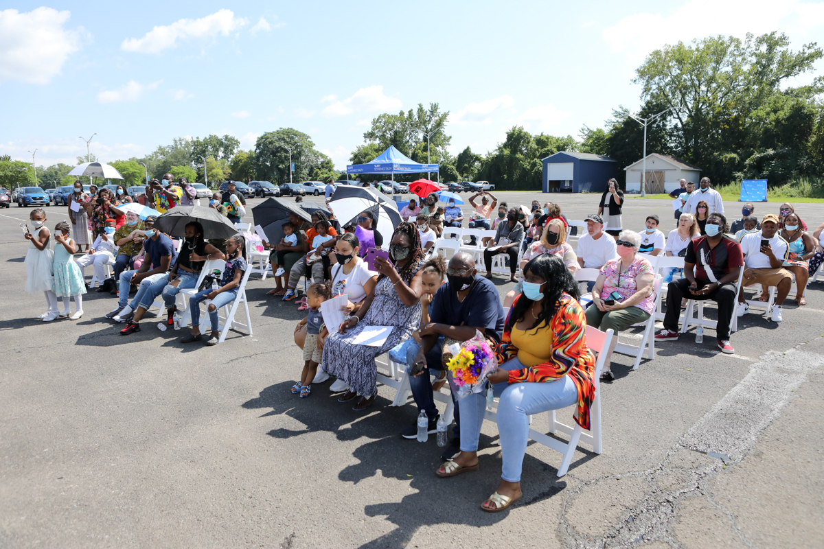 Group of attendees outside during HPOG healthcare graduation