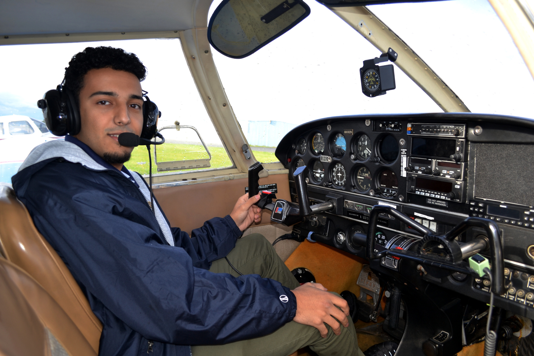 Idris Algabyali in cockpit of plane