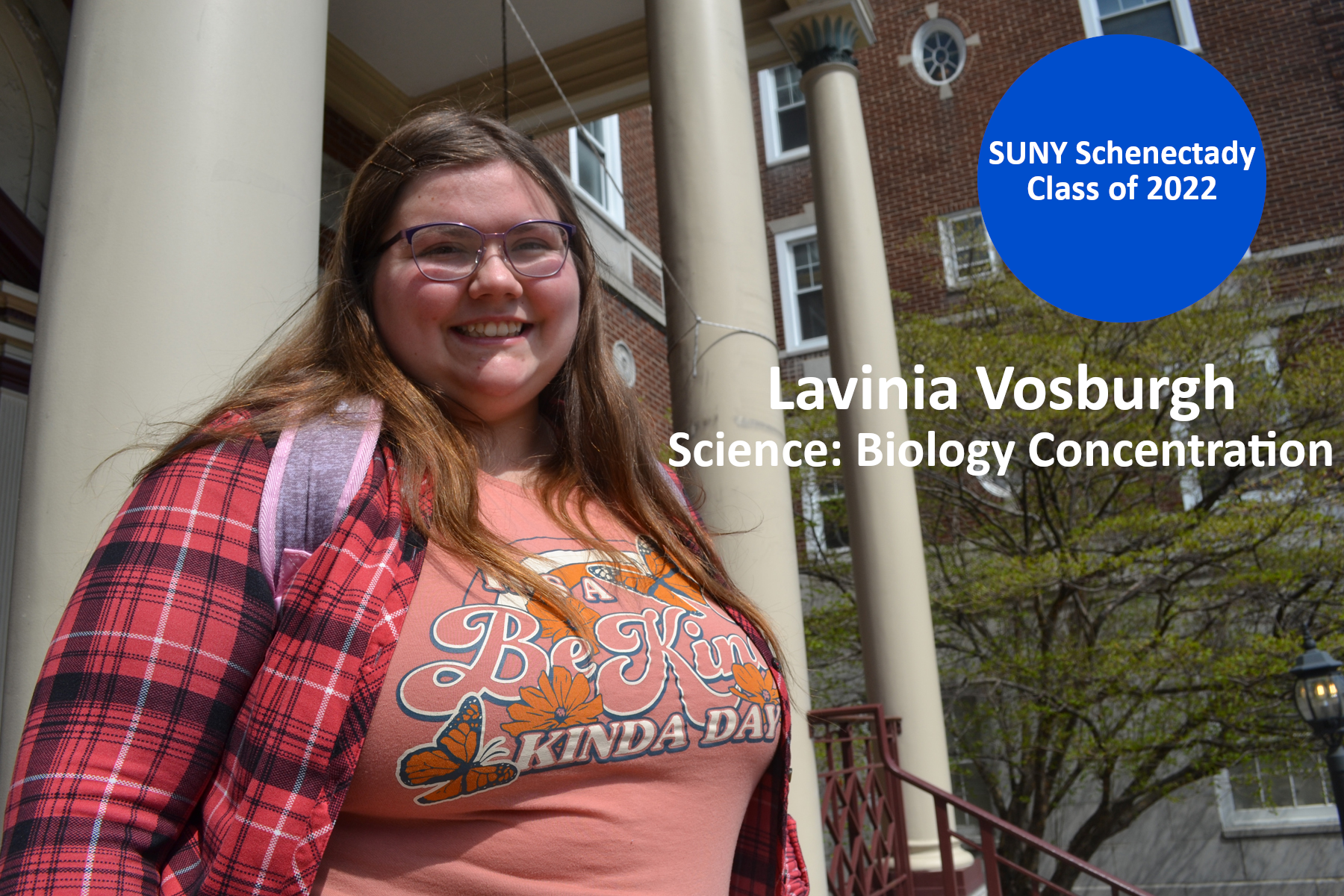 Lavinia Vosburgh standing on the front steps of Elston Hall