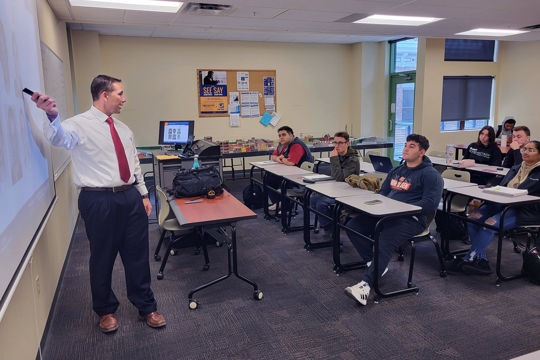 Assistant Professor Louis Aiossa teaching class.