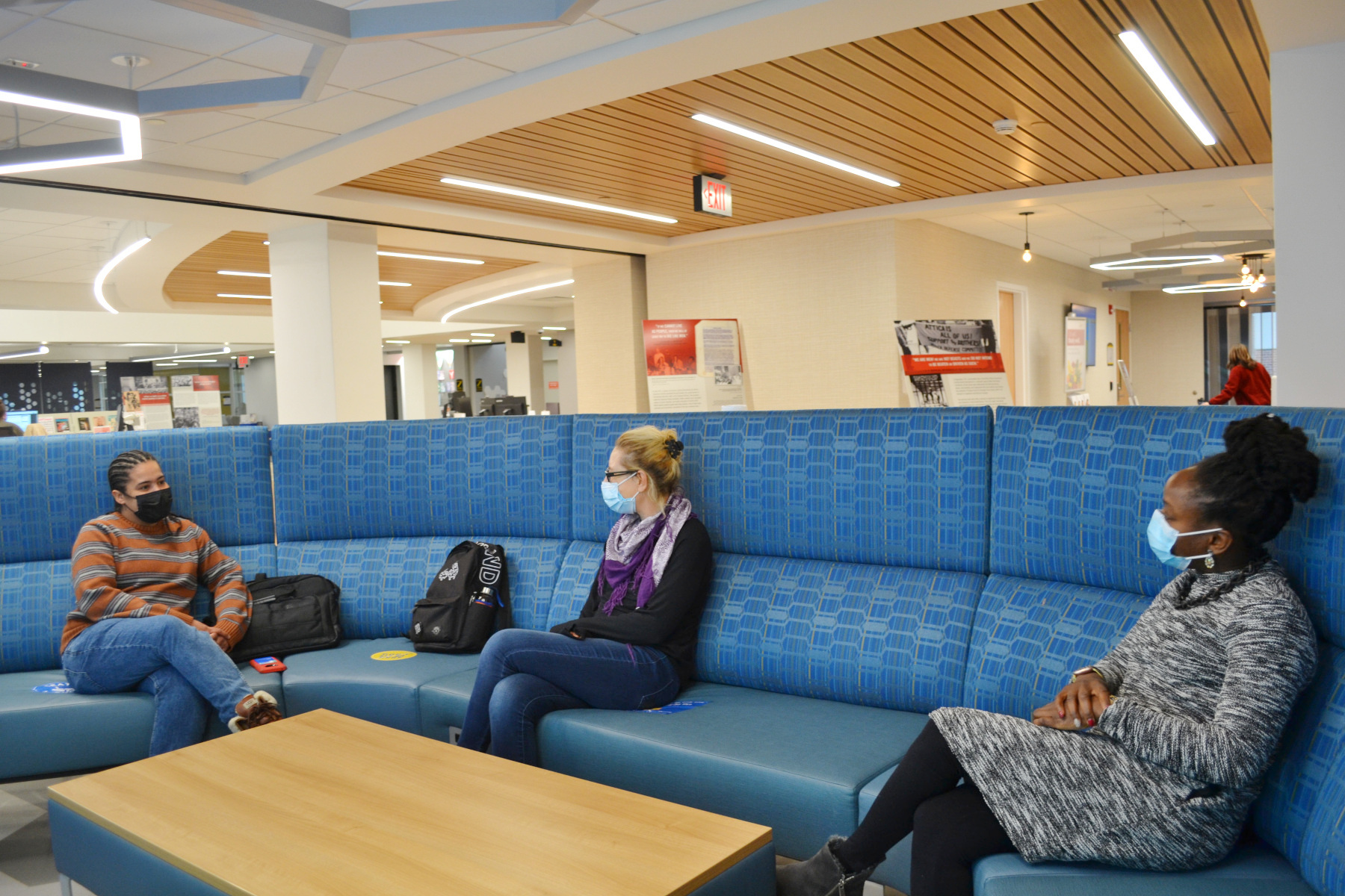 Jennifer Malave with Dr. Babette Faehmel and Dr. Imari Shaw, sitting in the Learning Commons