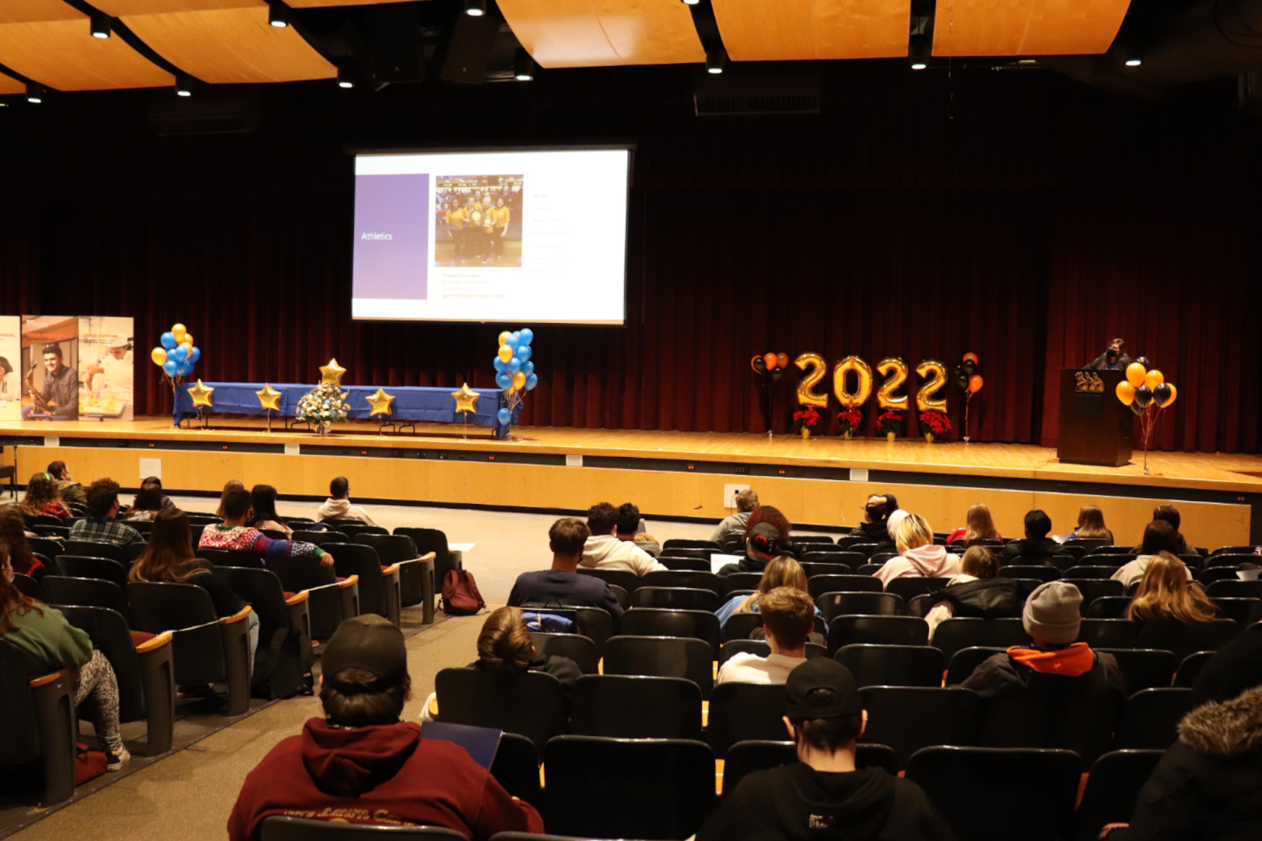 Laura Sprague speaking on stage