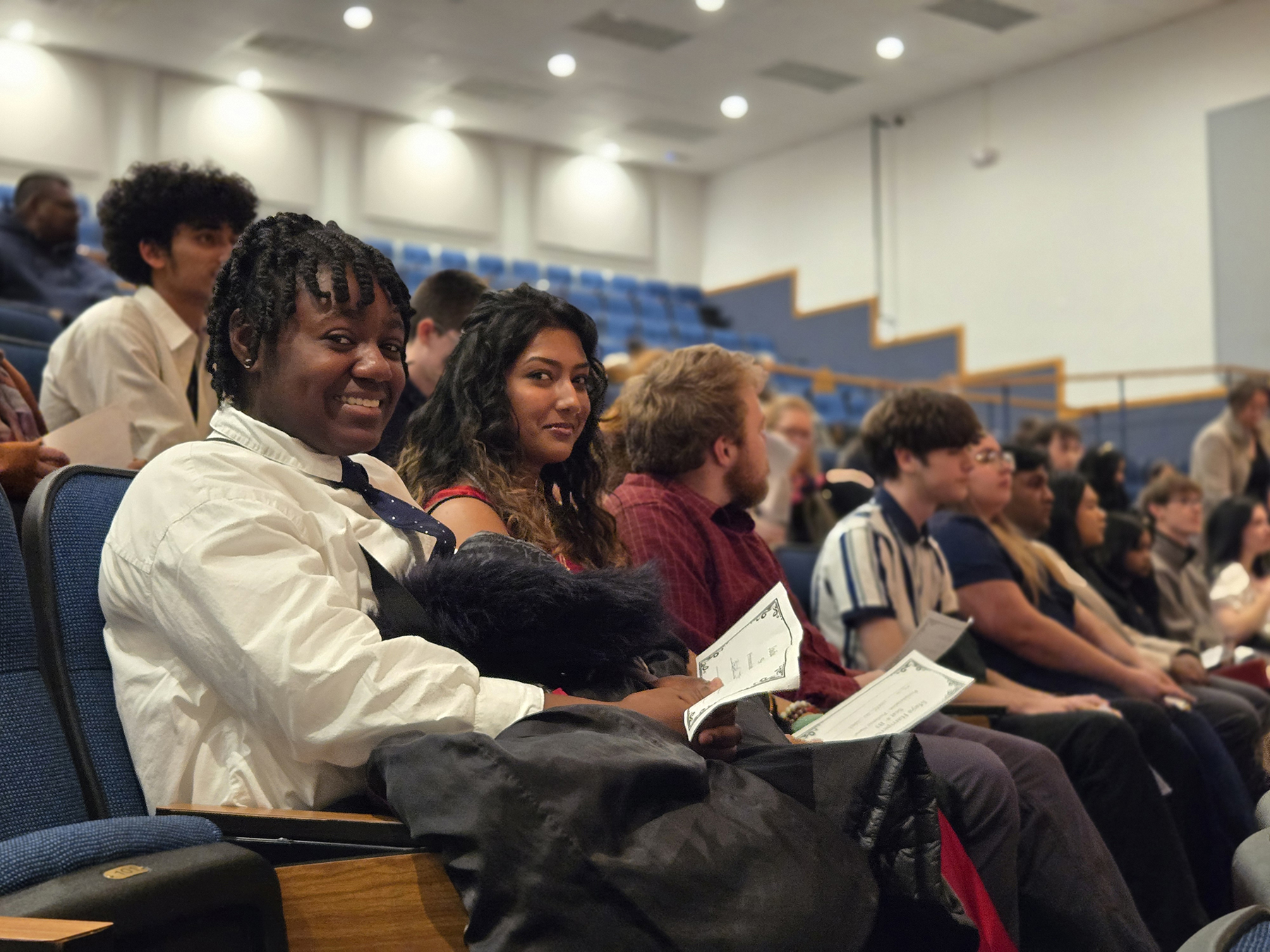 Students seated in auditorium