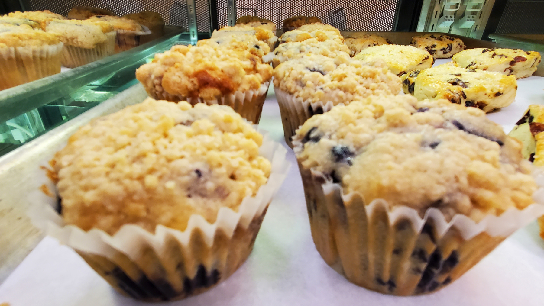 Muffins in bakery case