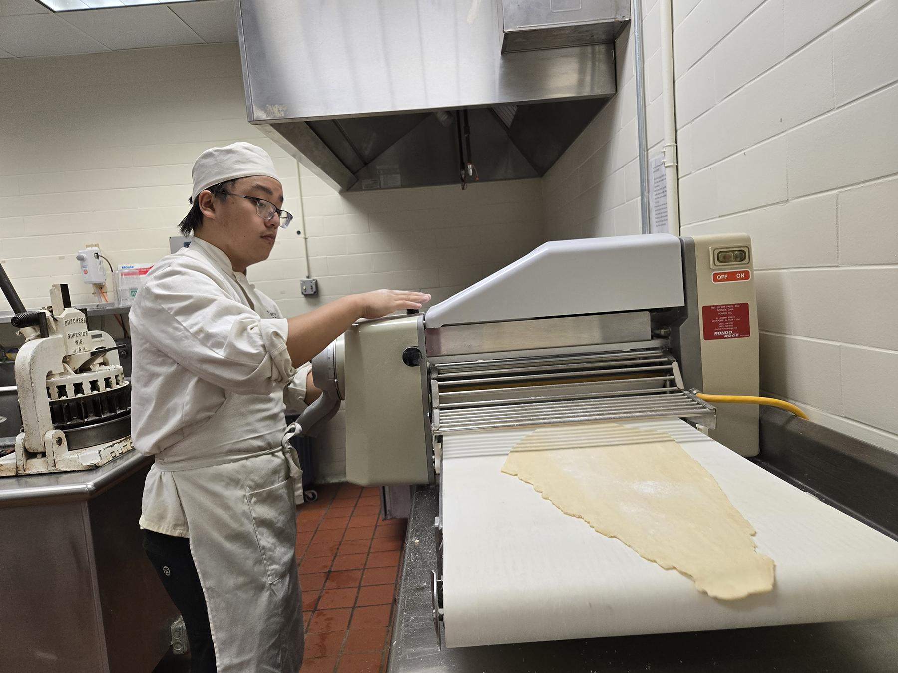 Student making dough