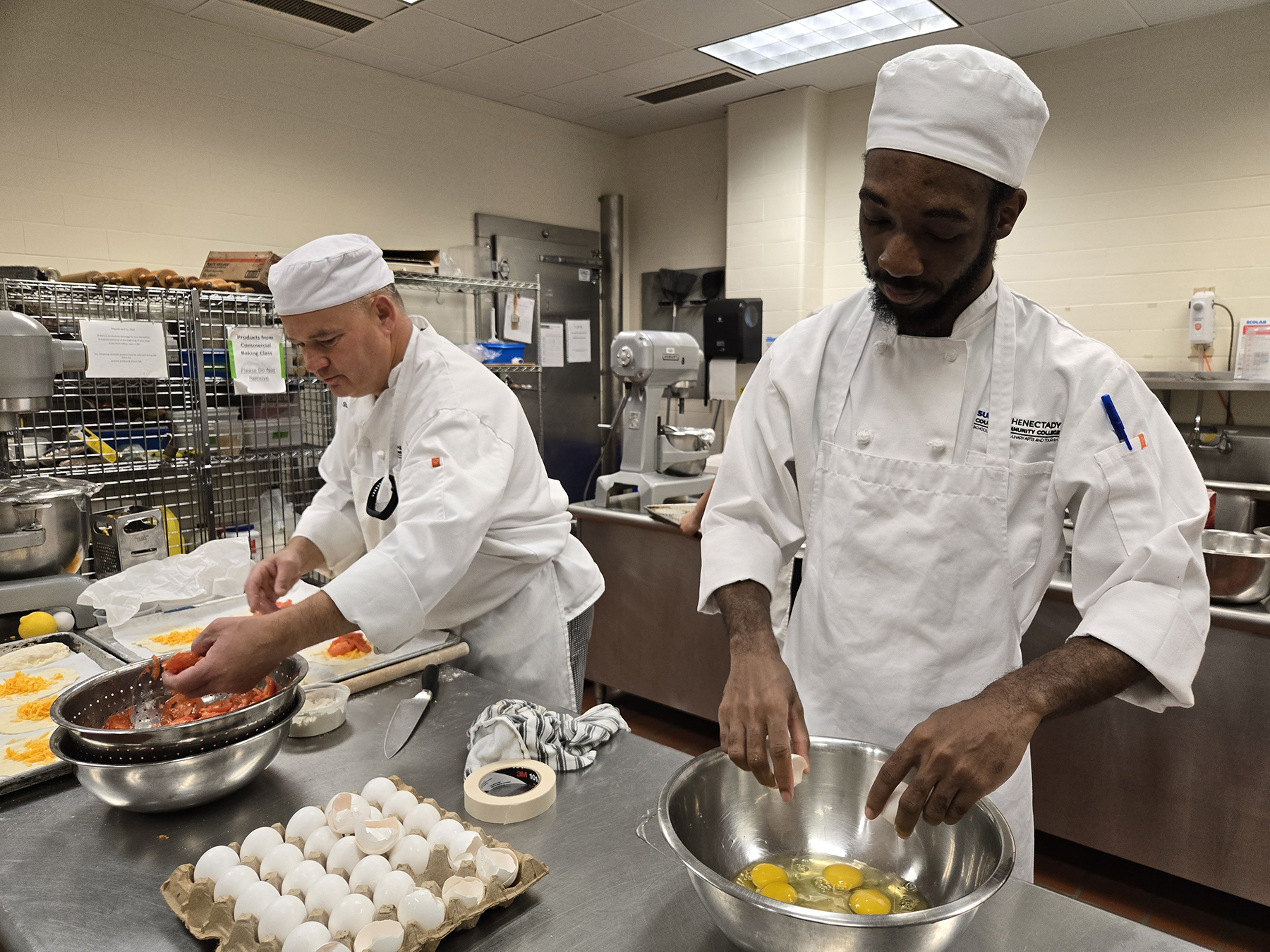 Student baking in kitchen