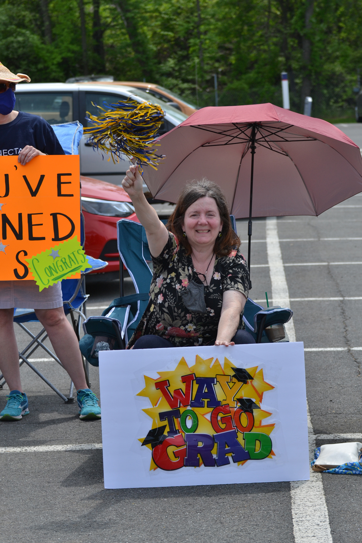 Robyn King, Counselor, cheering for graduates