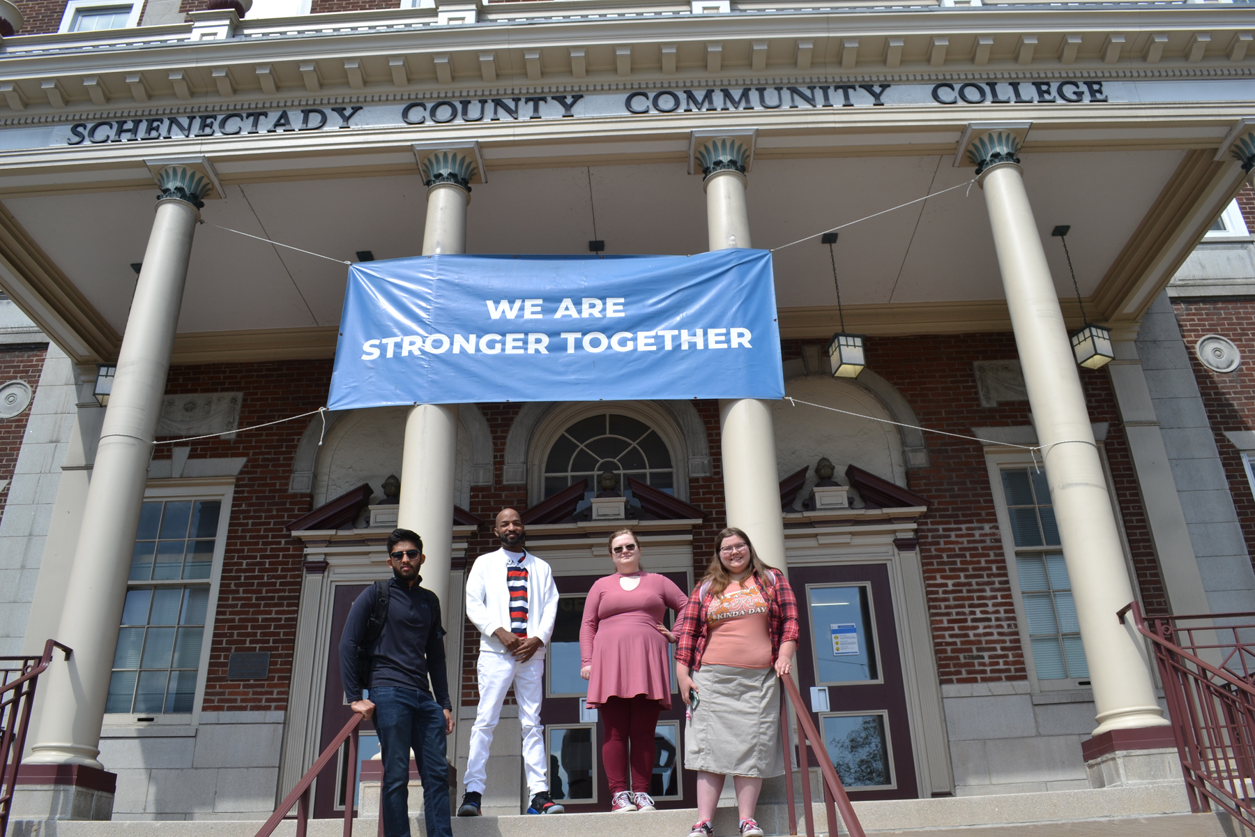 SGA leaders standing on front steps of Elston Hall