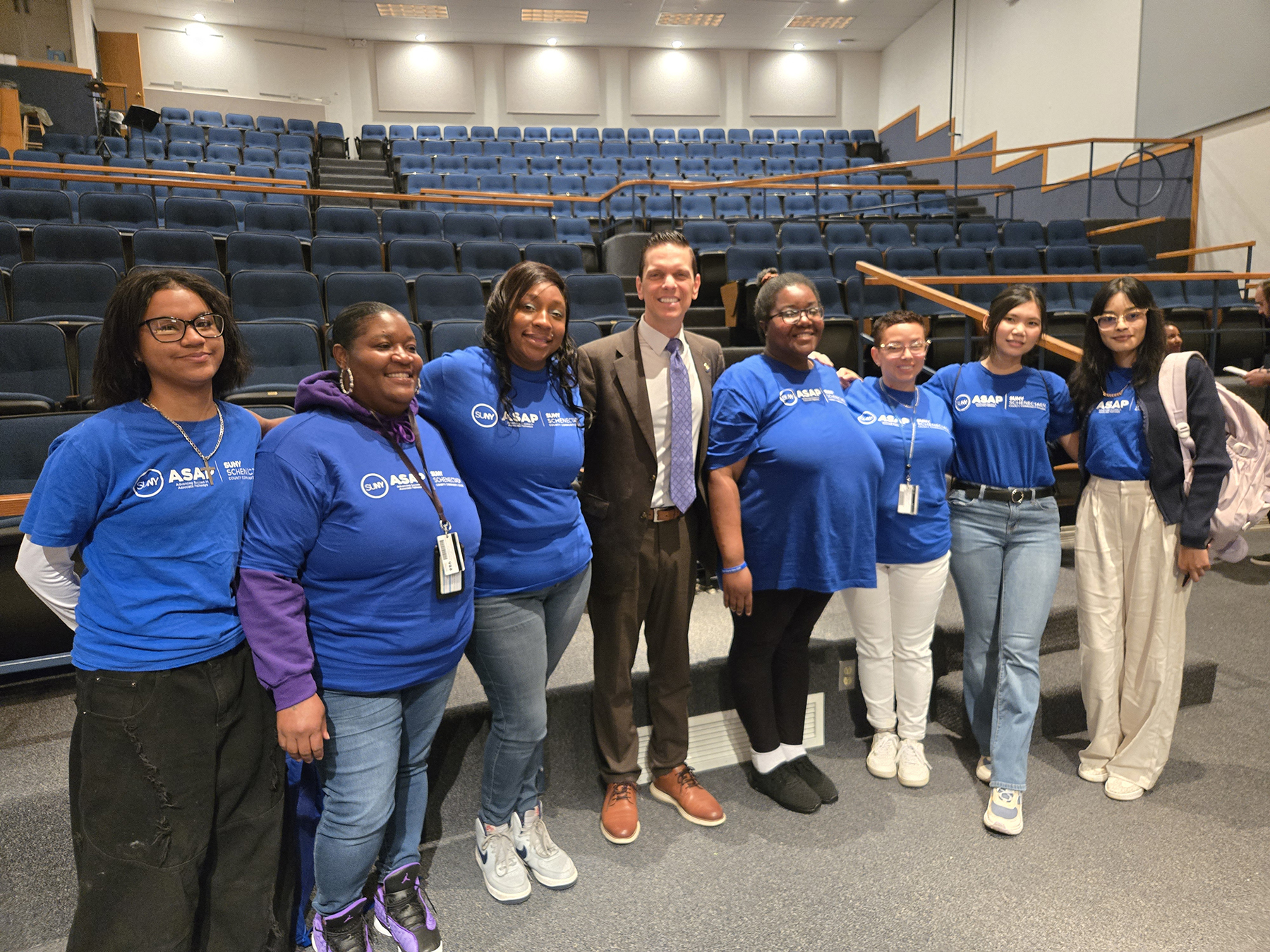 Students with Assemblyman Santabarbara inside auditorium