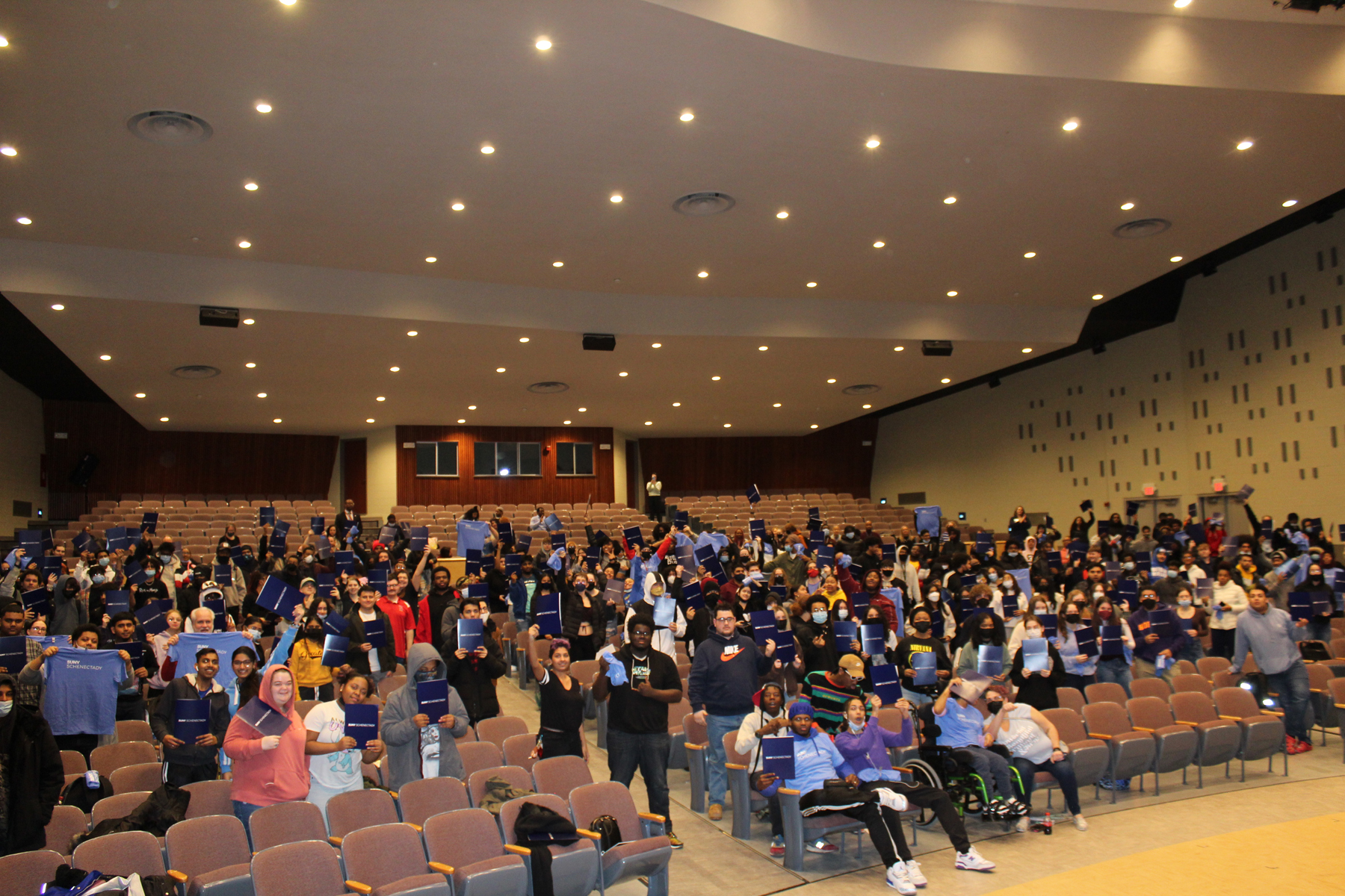 Schenectady High School students celebrating in auditorium