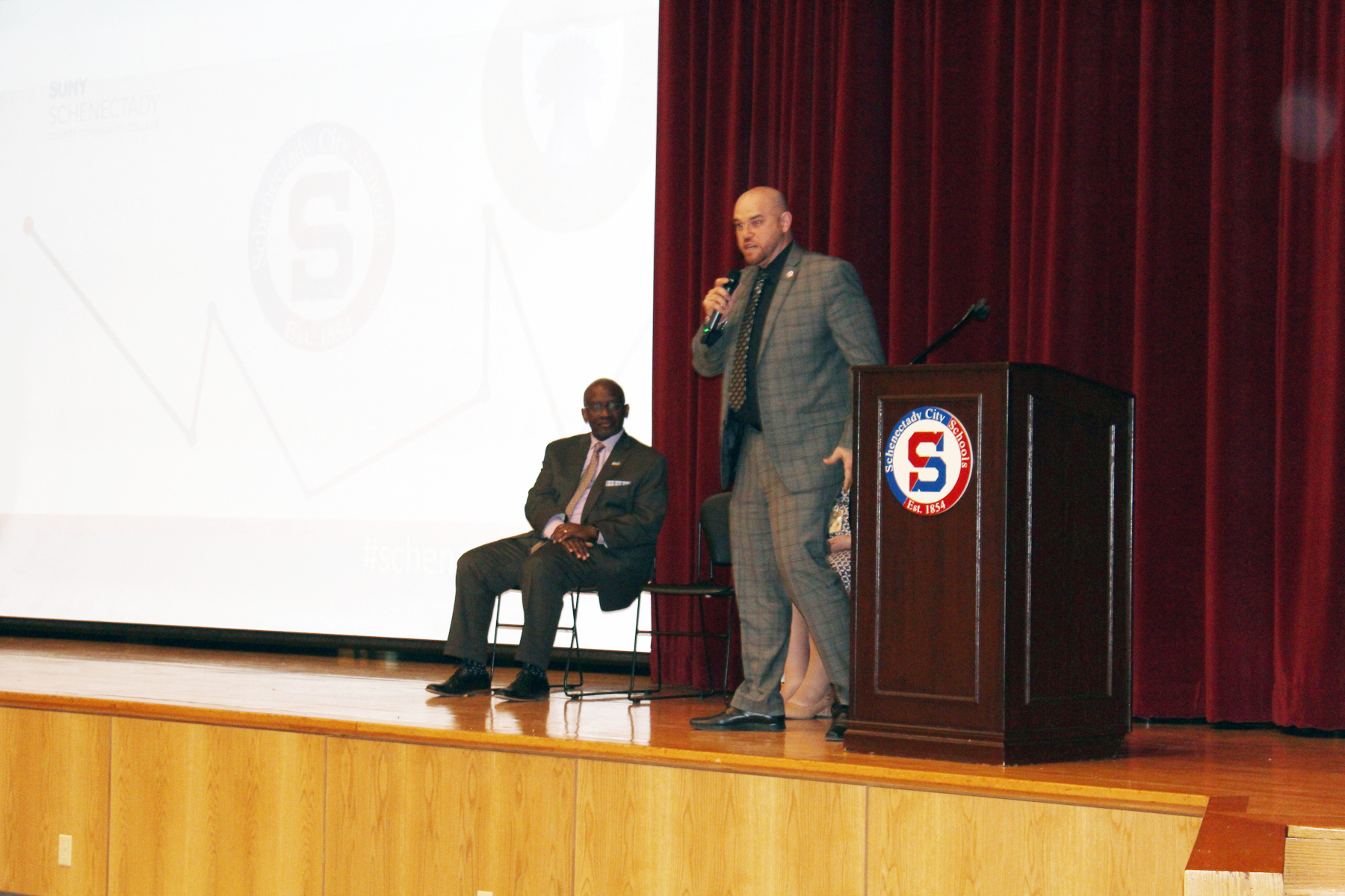 Anibal Soler Jr. speaking in Schenectady High School Auditorium