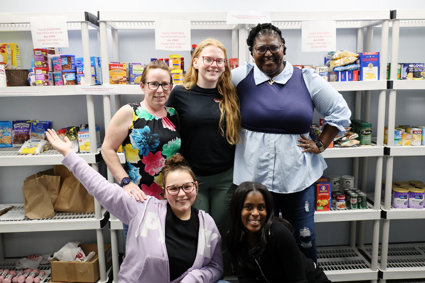 Students standing in Wildwood Cupboard Food Pantry