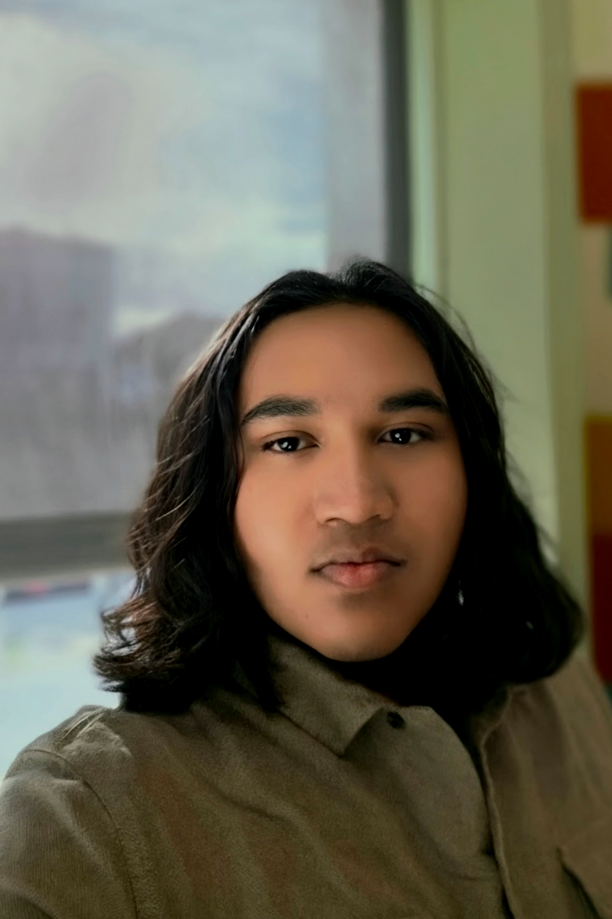 Shiv Gopilall smiling at camera