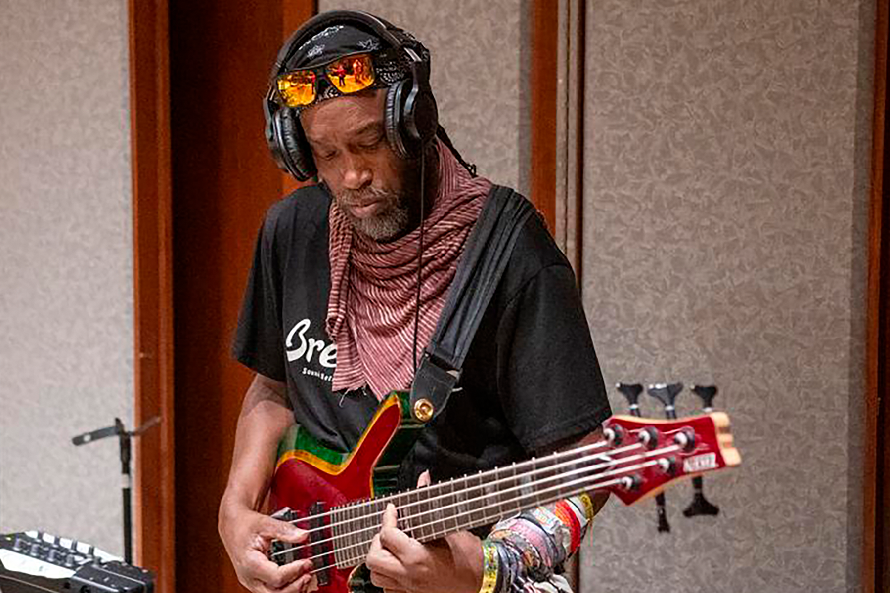 Amlak Tafari playing bass.