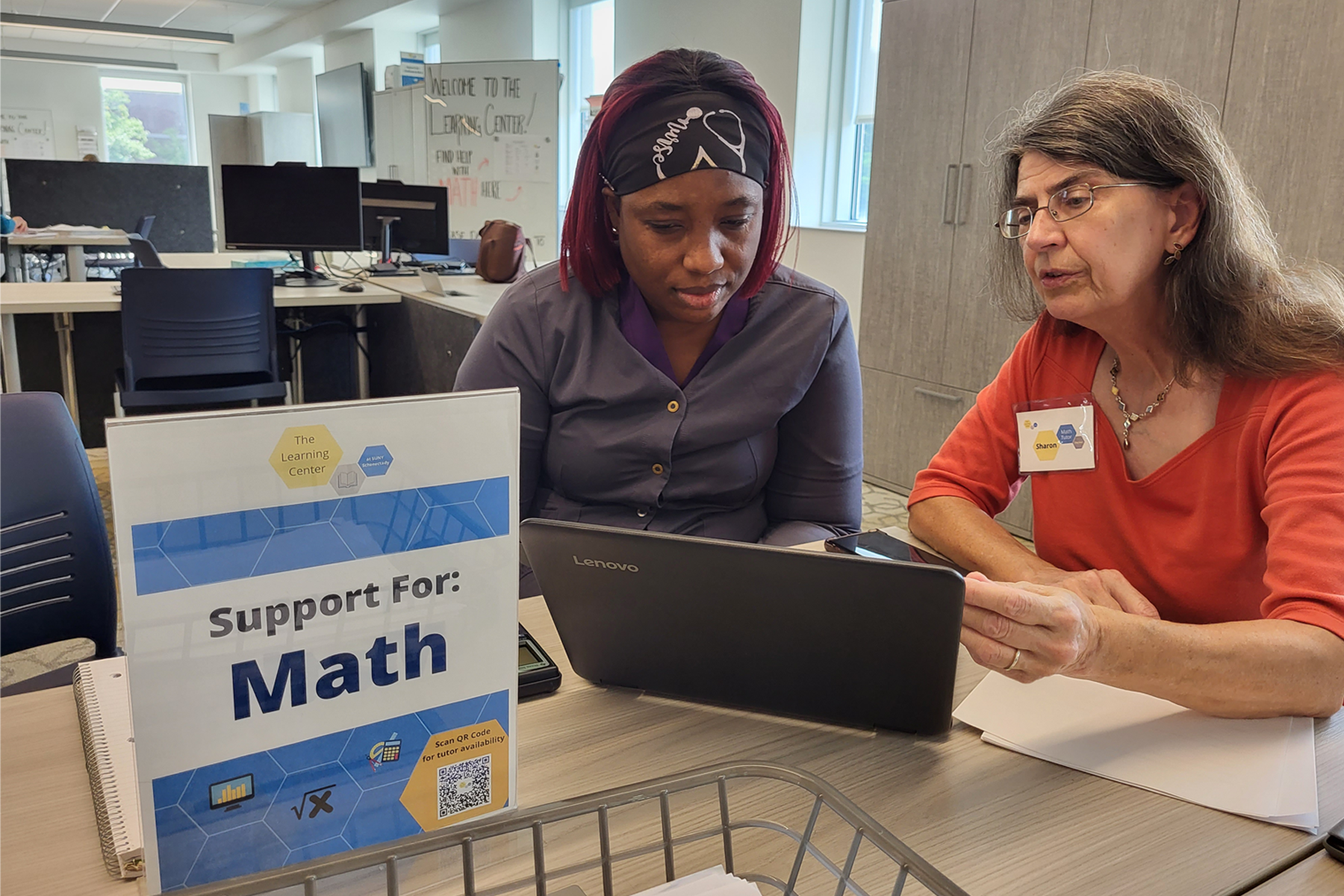 Tutor and student sitting at table in Learning Center